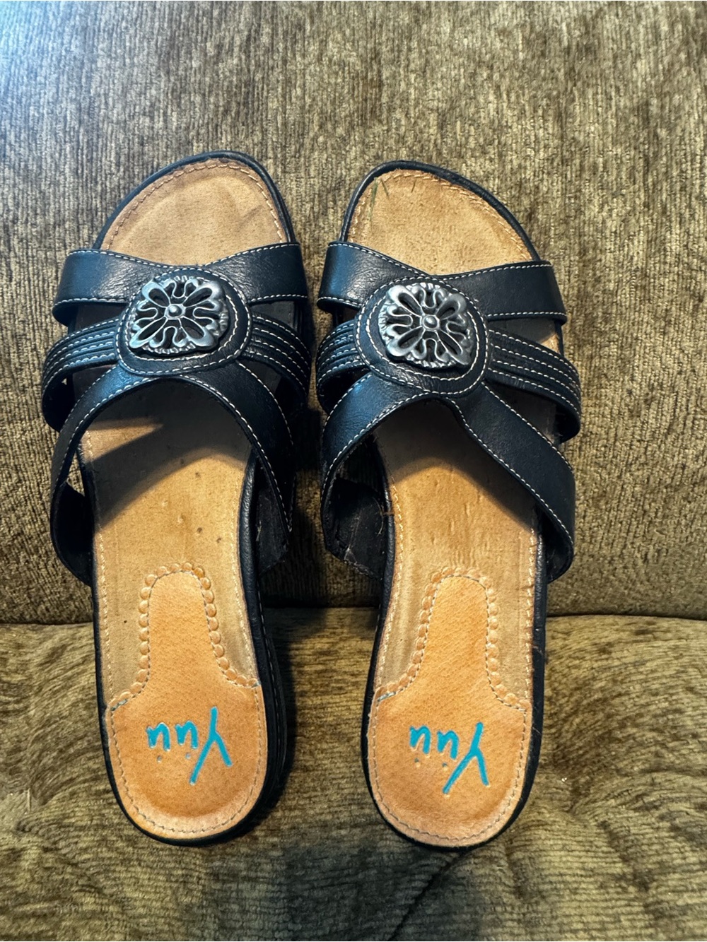 Yuu Black Slip-On Sandals with Silver Floral Medallion